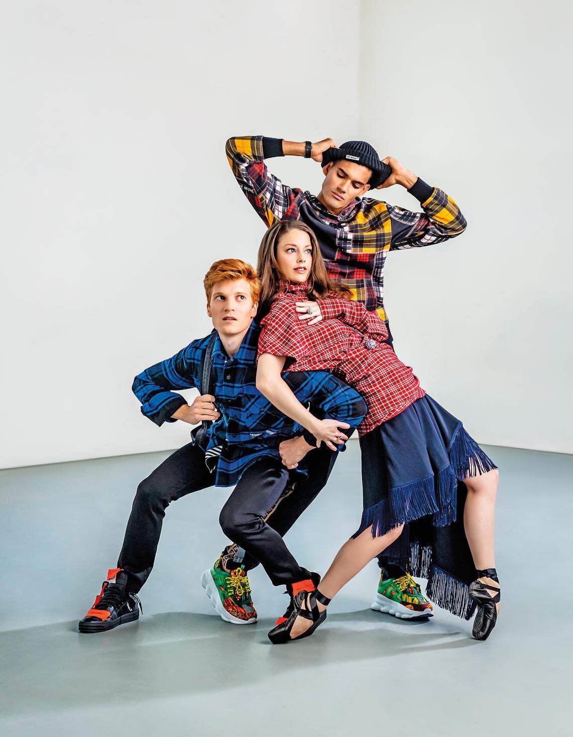 On Alexander: Jacket, shirt, shoes and backpack by Off-White, pants by Versace from Saks Fifth Avenue at Brickell City Centre. On Jennifer: Top and skirt by Calvin Klein 205W39NYC; jewelry by Tiffany &amp; Co. On Renan: Hat by Off-White from Saks Fifth Avenue at Brickell City Centre; pants by Diesel, jacket by Palm Angels from Saks Fifth Avenue at Bal Harbour Shops. Photograph by Nick Garcia.