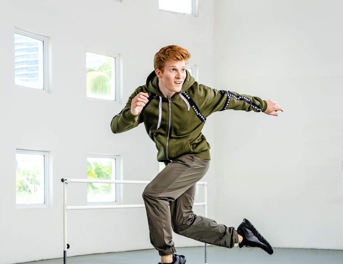 Principal soloist Alexander Peters of Miami City Ballet gets a lift in his Versace outfit from Saks at Bal Harbour Shops. Photograph by Nick Garcia.