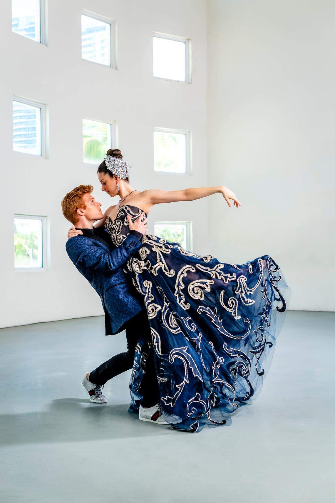 On Alexander: Jacket by Dsquared2, pants by Diesel, shoes by Gucci from Saks Fifth Avenue at Bal Harbour Shops; shirt by Jared Lang Collection at Aventura Mall. On Jennifer: Gown by Oscar de la Renta at Bal Harbour Shops; jewelry by Orianne Collins at Miami Design District; headband courtesy of Lesli Brown. Photograph by Nick Garcia.