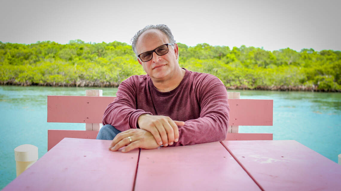He bought a private island in the Keys. Then he made a record-setting stained-glass table for it