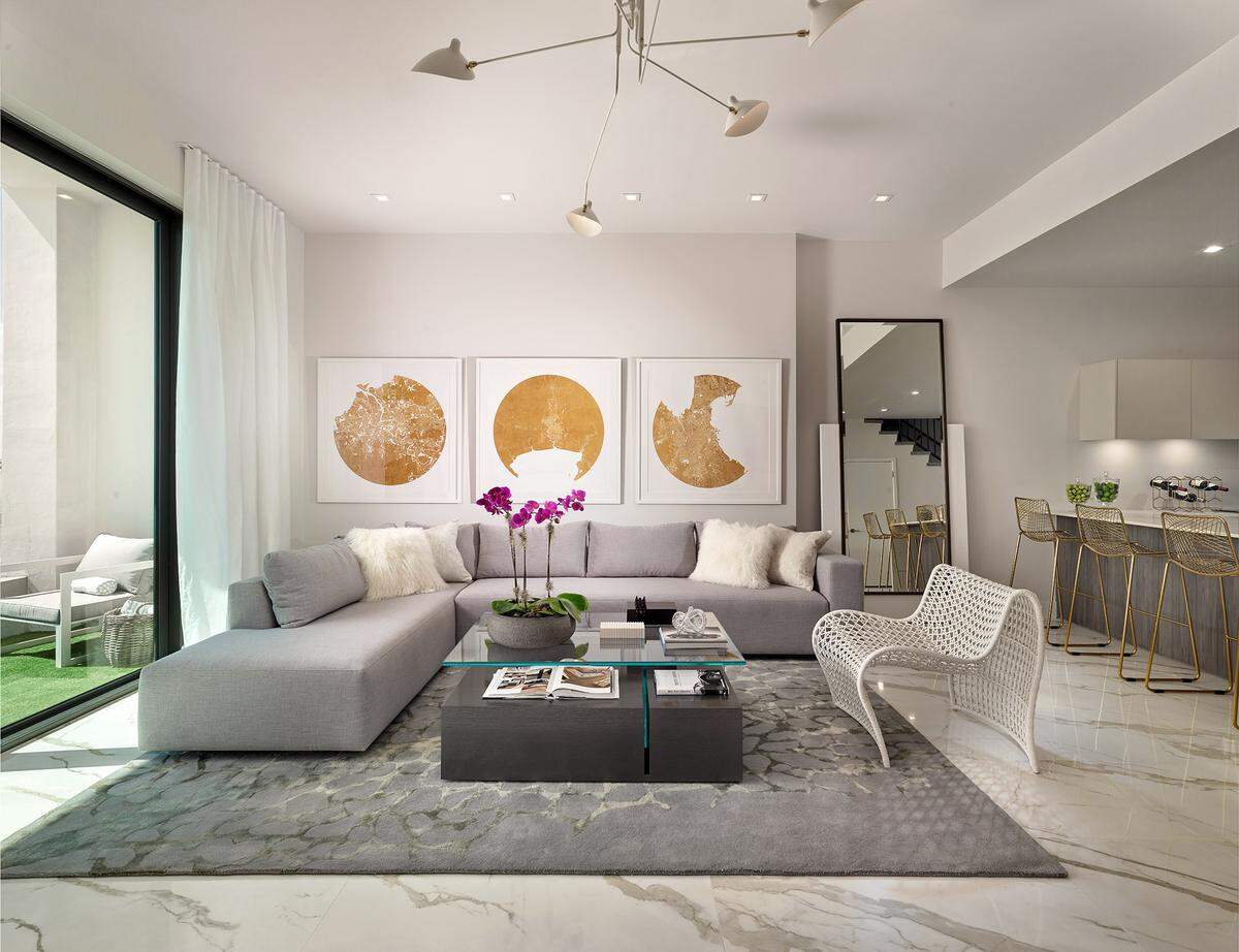 A two-level model residence at Giralda Place designed by B+G Design Inc.