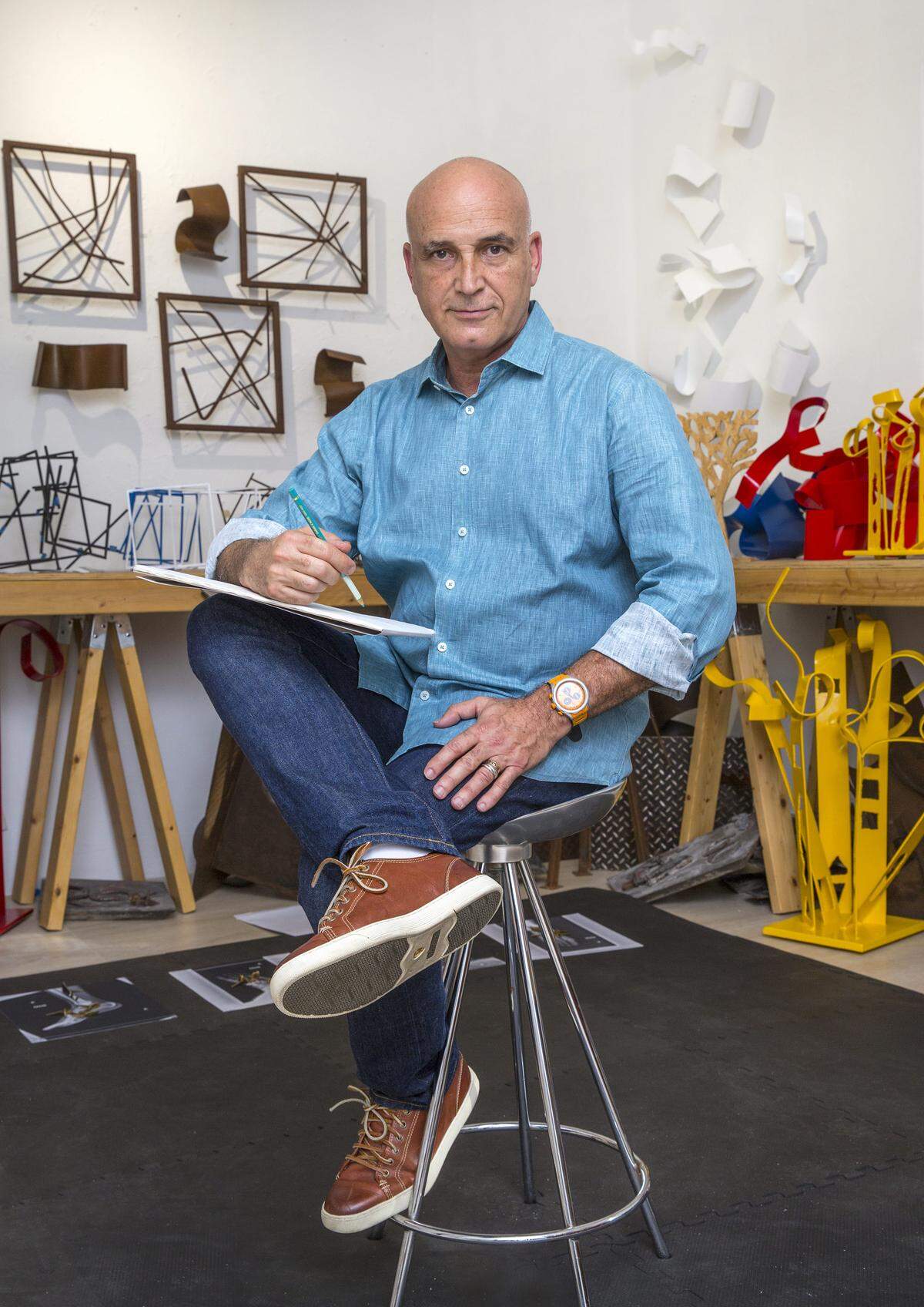 Zammy Migdal works from his home studio. Photograph by Andrew Innerarity.