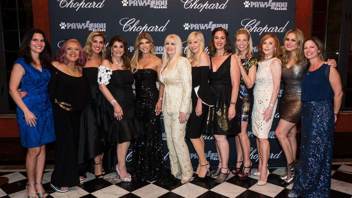 Animal rescue organization Paws4You raised $110,000 at its first casino-themed charity event, “Turning the Tables for Paws,” at The Cruz Building in Miami. Pictured from left: Joyce Roseman, Norma Jean Abraham, Maria Aleman, Ann Rubino, Teresa Giudice, Kathy Cowan, Rita Schwartz, Cynthia Demos Rubino, Dana Rhoden, Lois Russell, Silvana Camargo, Carol Caridad.
