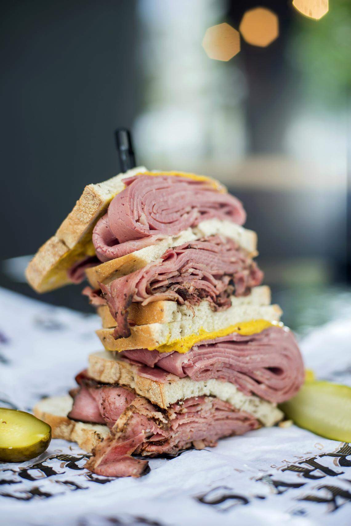 The combo pounder at Hank &amp; Harry's in Miami Beach and South Miami stacks half a pound of any two meats on bread of your choice. Photograph by Felipe Cuevas for INDULGE.