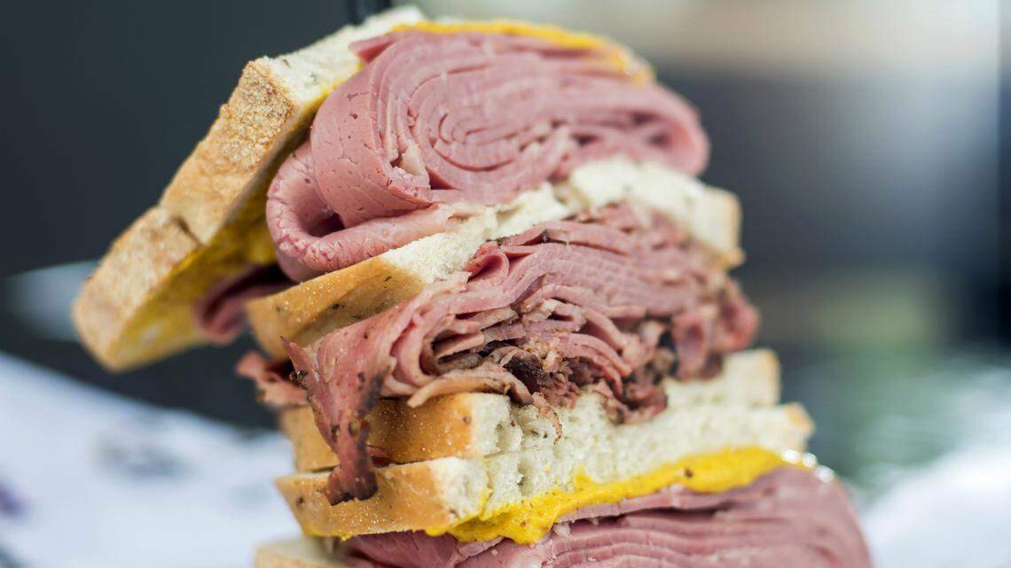 The combo pounder at Hank & Harry's in Miami Beach and South Miami stacks half a pound of any two meats on bread of your choice. Photograph by Felipe Cuevas for INDULGE.