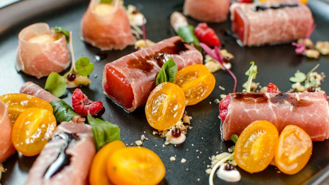 Picasso's Prosciutto & Melon at LaMuse Cafe stars raspberry-infused cantaloupe wrapped in imported Italian cured meat.