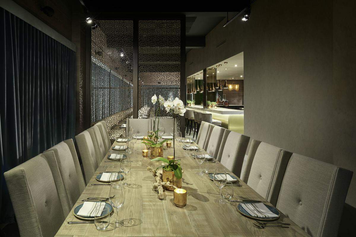 The private dining area at Zucca in Coral Gables can seat up to 18 guests.