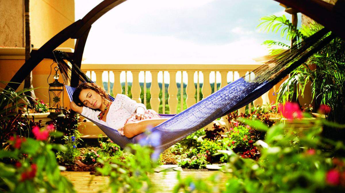 Serenity now: Hammocks are strategically positioned throughout the Ritz-Carlton property in Orlando, giving guests easy access to naps.