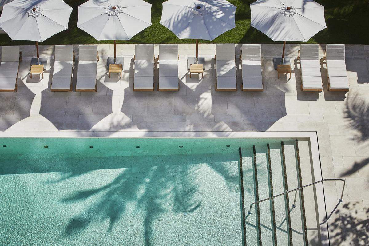 Poolside vibes at Four Seasons Hotel at The Surf Club.
