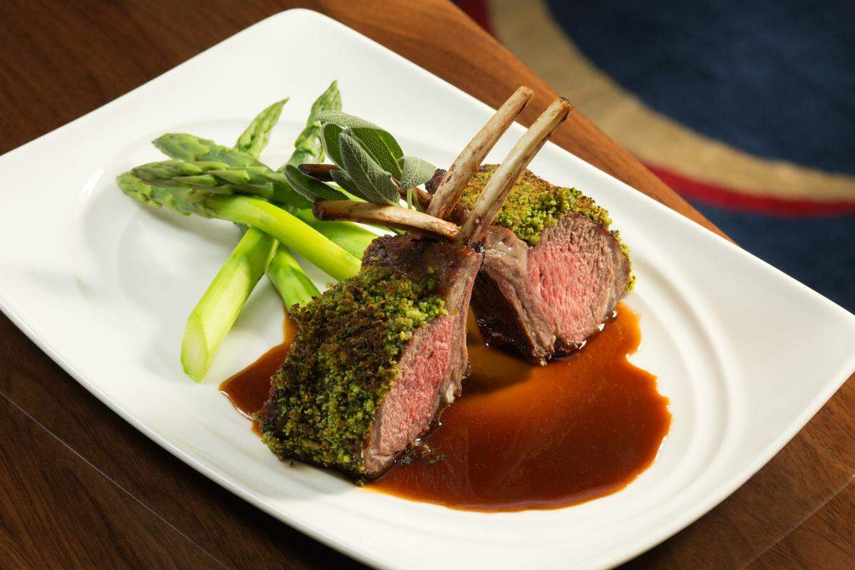 A rack of Colorado lamb served at The Breakers in Palm Beach. Photograph by Lila Photo.