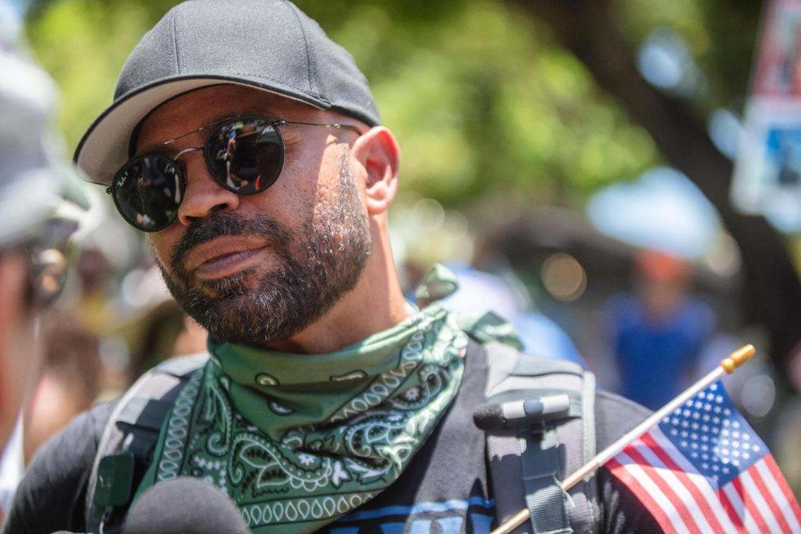 Enrique Tarrio, the former Proud Boys leader who was pardoned by President Donald Trump for his role in the Jan. 6 attack on the nation’s Capitol, interviews people at the ‘No Kings’ anti-Trump protest at the Torch of Friendship monument at Bayfront Park in Miami, Florida, on June 14, 2025.