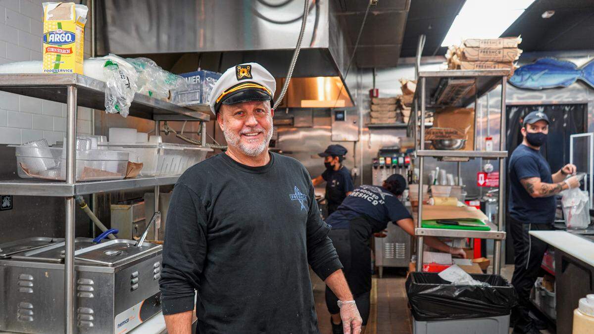 Mario Palazon, here in the kitchen of the original FreshCo Fish Market & Grill in Kendall, says that the competition for stone crabs among Miami restaurants is real.