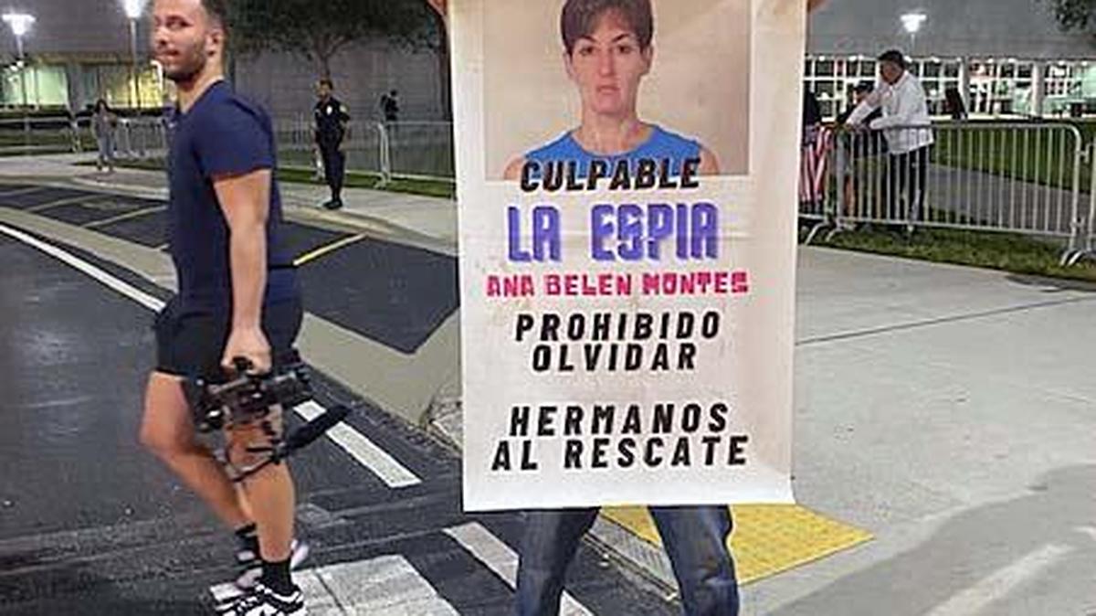 A demonstrator at FIU denouncing the upcoming release of Cuban spy Ana Belen Montes.