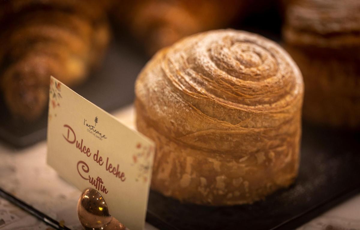Dulce de leche cruffin on display at the counter of L’Artisane Creative Bakery in Coral Gables