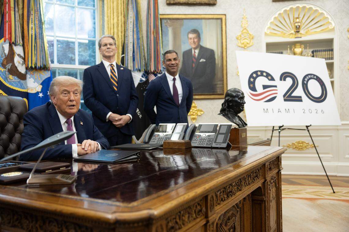 President Donald Trump with U.S. Treasury Secretary Scott Bessent (C) and Miami Mayor Francis Suarez (R) as he announces plans to host the 2026 G20 summit in Miami, Florida during a press availability in the Oval Office of the White House on September 5, 2025 in Washington. (Francis Chung/Pool/Sipa USA)