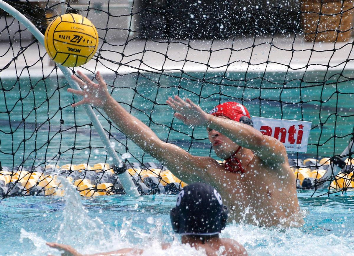 Mater Lakes Academy goalkeeper Adria Laguna attempts to save a goal during the FHSAA Boys Water Polo State Championships final match against Westminster Academy on Saturday, April 26, 2025 at Gian Zumpano Aquatic Center in Miami. Andrew Uloza / for Miami Herald