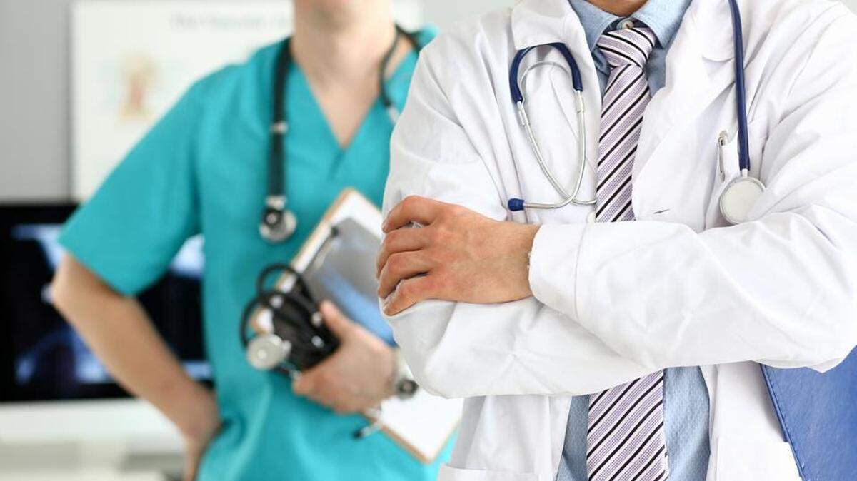 A doctor and a nurse are shown in this file photo.