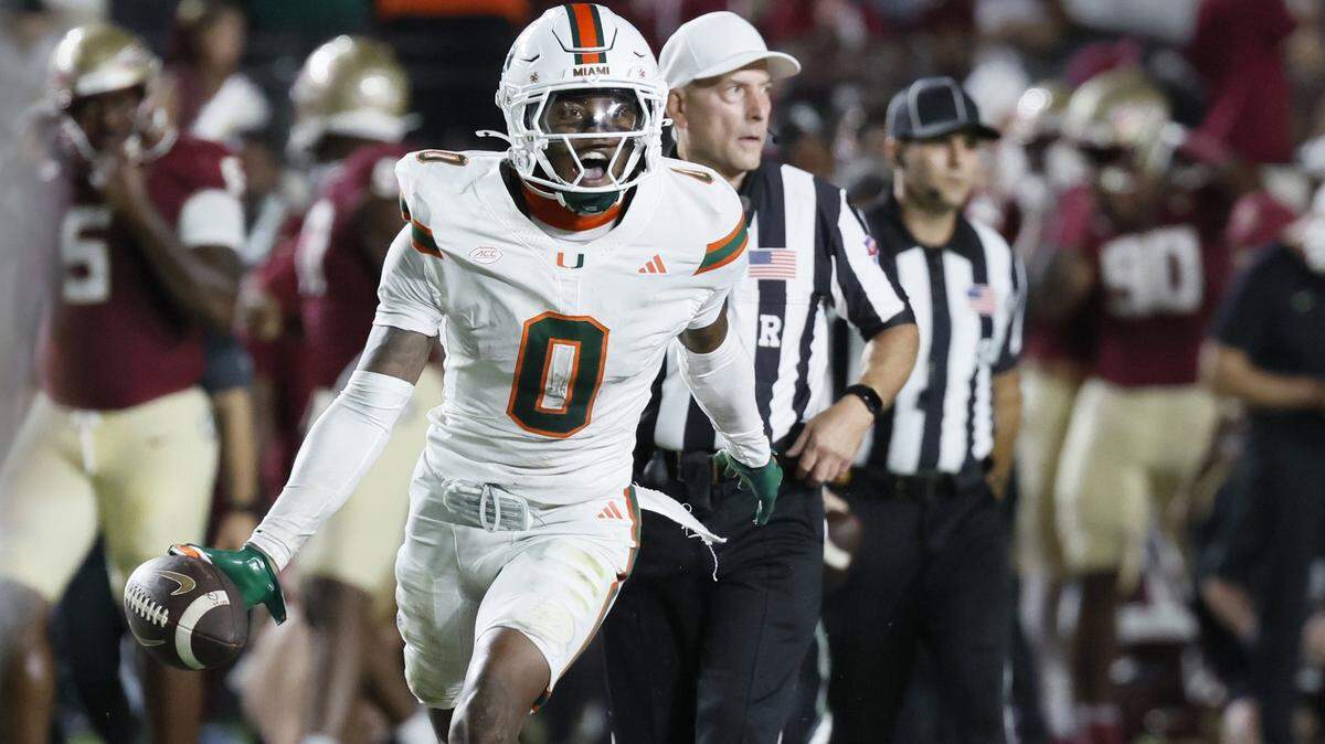 Miami Hurricanes defensive back Keionte Scott (0) recovers a fumble in the first half against the Florida State Seminoles at Doak Campbell Stadium in Tallahassee, Florida, on Saturday, October 4, 2025.