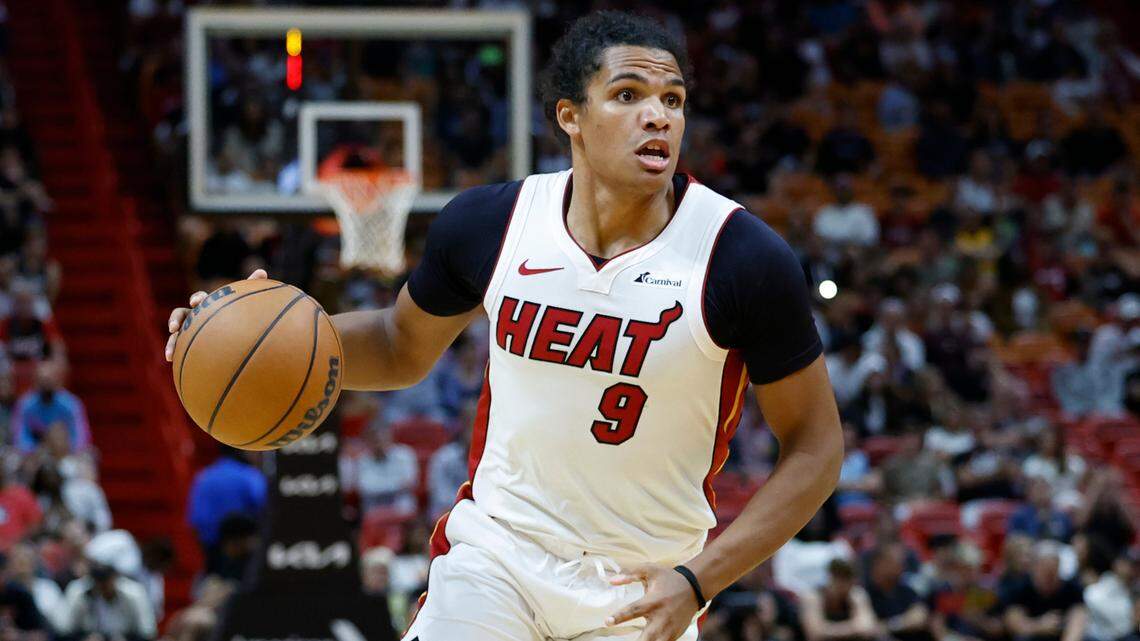 Miami Heat guard Dru Smith (9) drives to the basket during the game against the Brooklyn Nets in the first half at Kaseya Center in Miami on October 18, 2023.