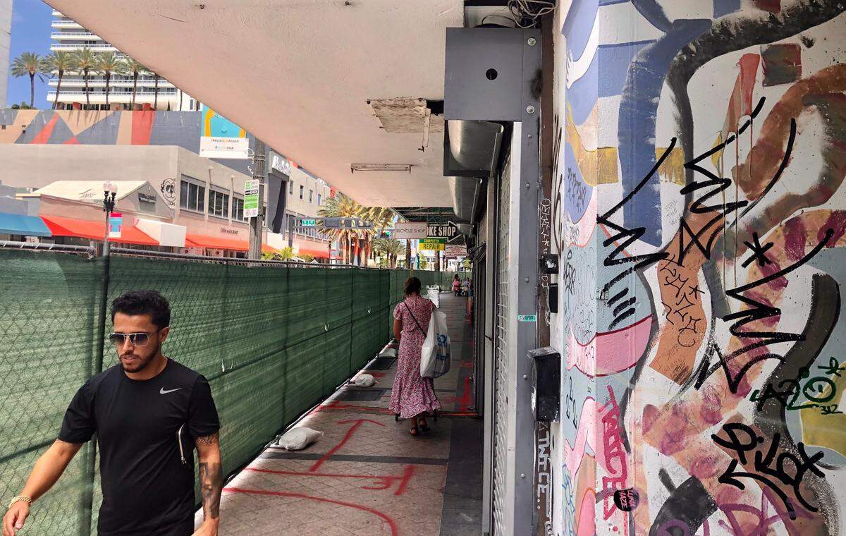 The sidewalks on Flagler Street between Biscayne Boulevard and E Second Avenue are fenced off while crews begin a two-year construction project to overhaul Flagler. This section is expected to be fenced off for about nine months.