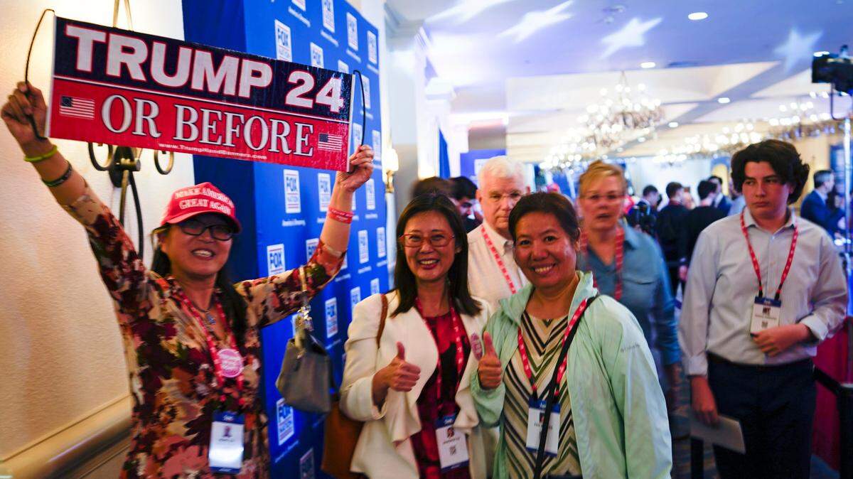 Attendees show their support for former President Donald Trump at the Conservative Political Action Conference (CPAC) Thursday, Feb. 24, 2022, in Orlando, Fla.