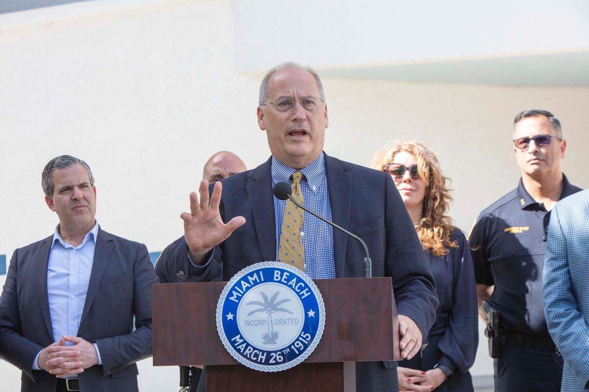 The mayor of Miami Beach, Dan Gelber, talks as Miami Beach officials announce a state of emergency for spring break and crowd-control measures at a press conference outside Miami Beach City Hall on March 21, 2022.