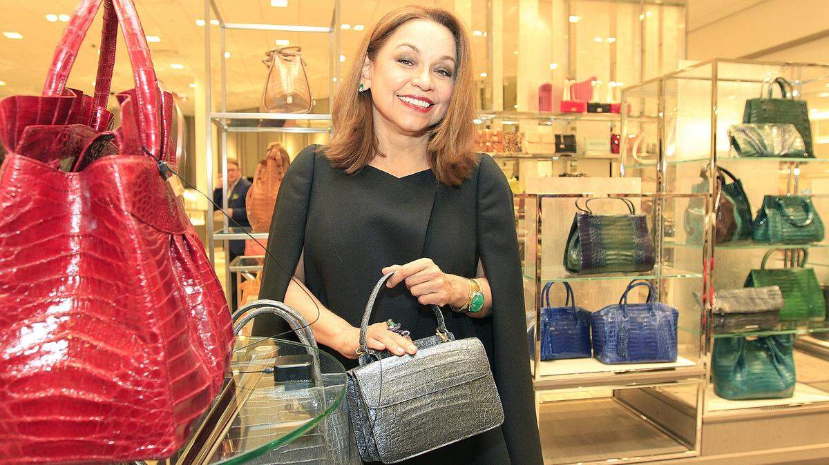 In a 2012 photo, Colombian high-end purse designer, Nancy Gonzalez, hosts an event at Neiman Marcus in Bal Harbour Shops.