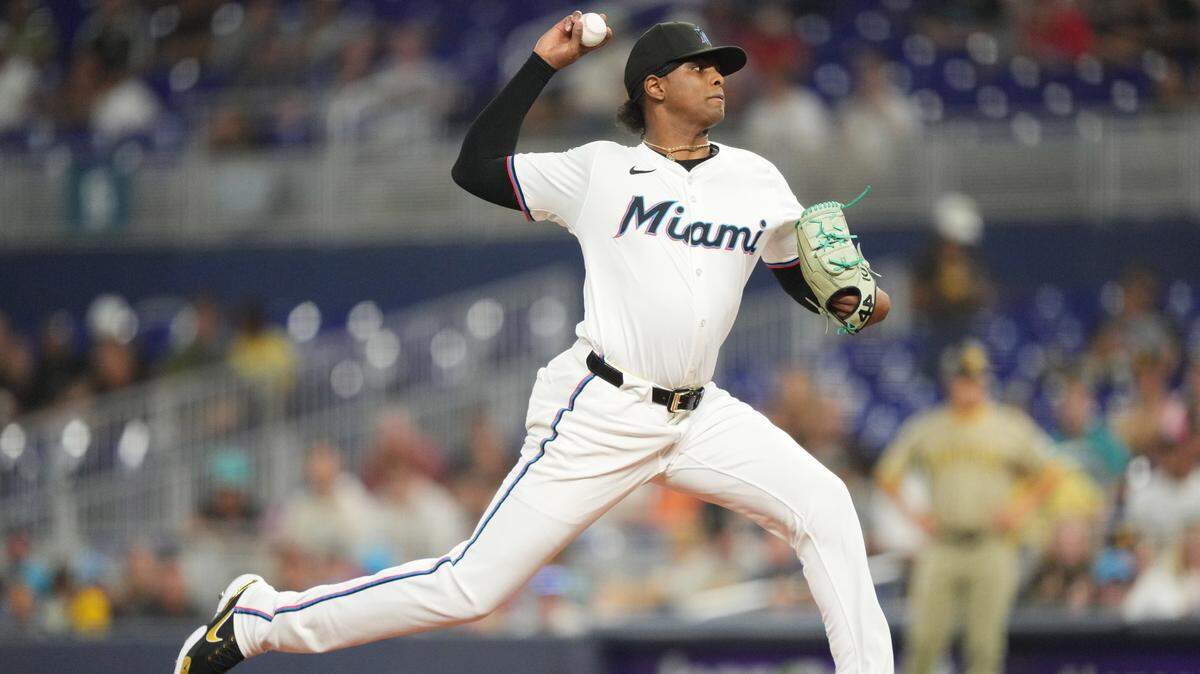 Jul 22, 2025; Miami, Florida, USA; Miami Marlins pitcher Edward Cabrera (27) pitches in the first inning against the San Diego Padres at loanDepot Park. Mandatory Credit: Jim Rassol-Imagn Images