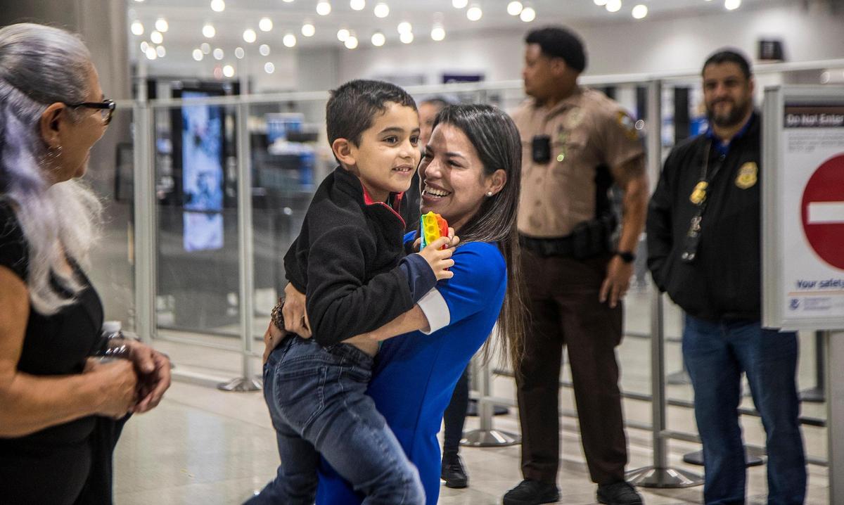 Yanet Leal Concepcion hugs her son Jorge “JoJo” Morales, 6, as they reunited at MIA on Tuesday Nov. 1, 2022, two months after he was reported missing by his mother on Aug. 27, after his father violated their custody agreement by failing to return him to her.