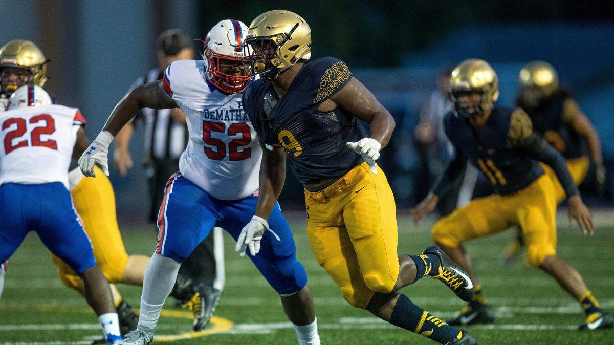 St. Thomas Aquinas’ DL Tyreak Sapp (99) avoids a tackle during the Nationally televised football matchup between DeMatha and St. Thomas Aquinas on Saturday August 25, 2018. St. Thomas Aquinas won 38-0