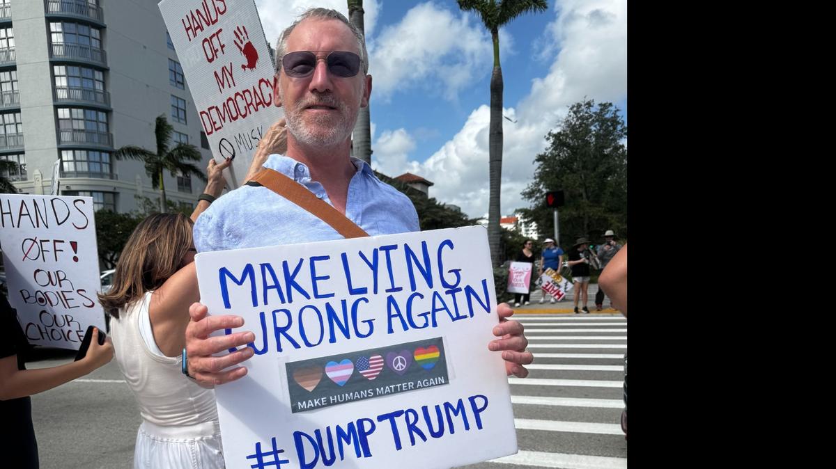 Todd Katzman, of Fort Lauderdale, said he went to the Hands Off! Protest in Hollywood on April 5, 2025, because he is worried about the Trump administrations efforts to marginalize LGBTQ communities, immigrants and other people. “I can’t sit home any longer.”
