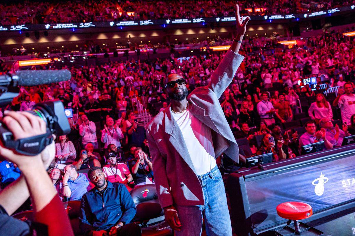 Miami Heat icon Dwyane Wade reacts to the crowd during an NBA game at the Kaseya Center on Monday, October 28, 2024, in Miami, Fla. 