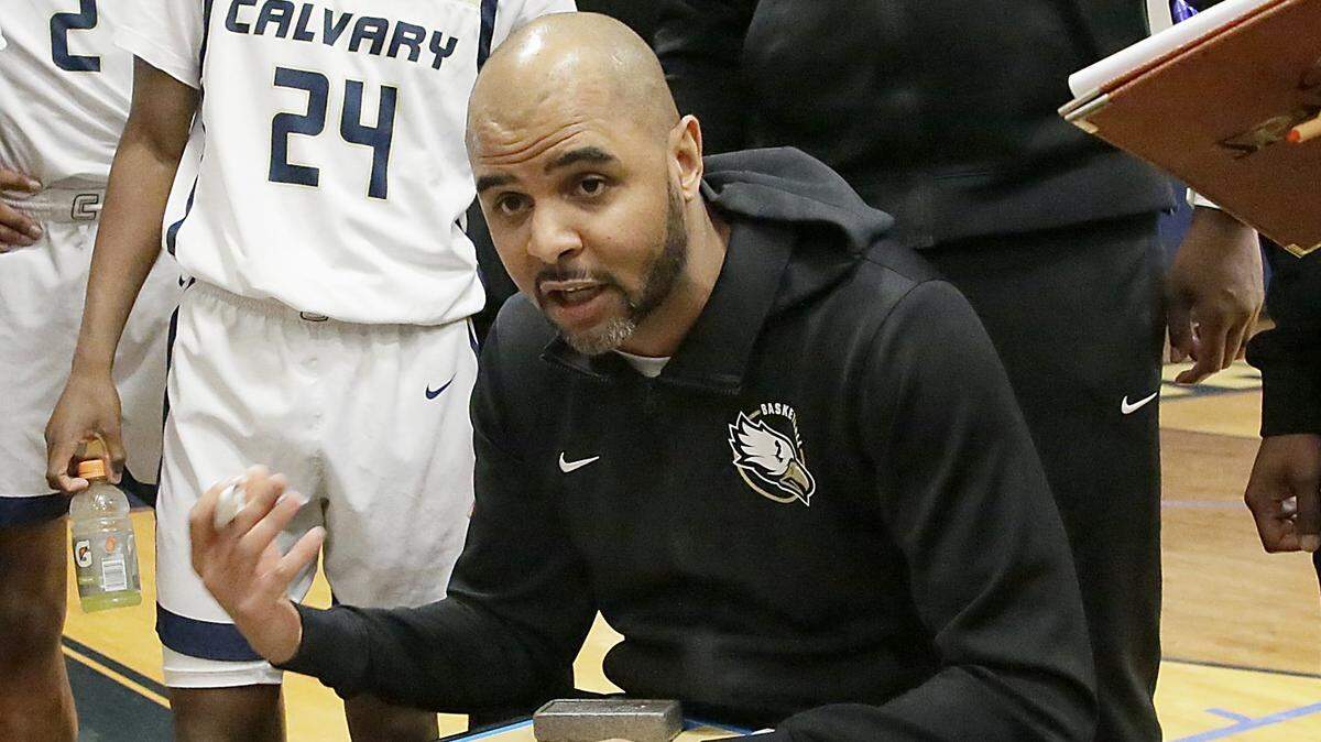 Calvary Christian head coach Cilk McSweeney takes a time-out during regional basketball semifinal playoff game against North Broward on Monday, February 17, 2025 at Calvary Christian School in Fort Lauderdake. Andrew Uloza / for Miami Herald