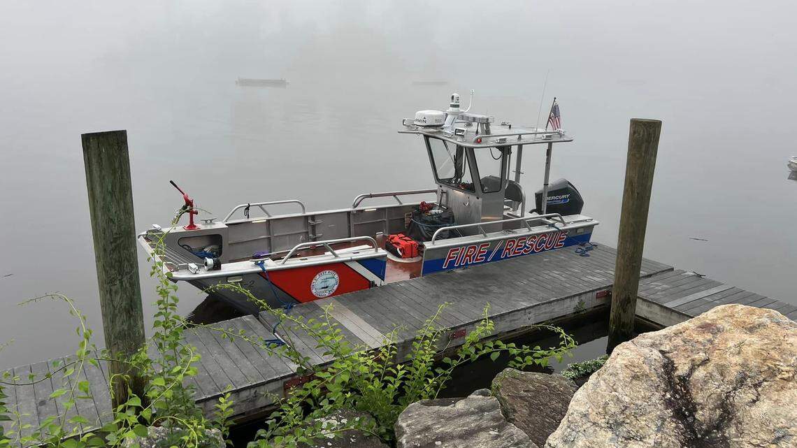 A camp counselor was attacked by a bobcat on an island in Connecticut, officials said.