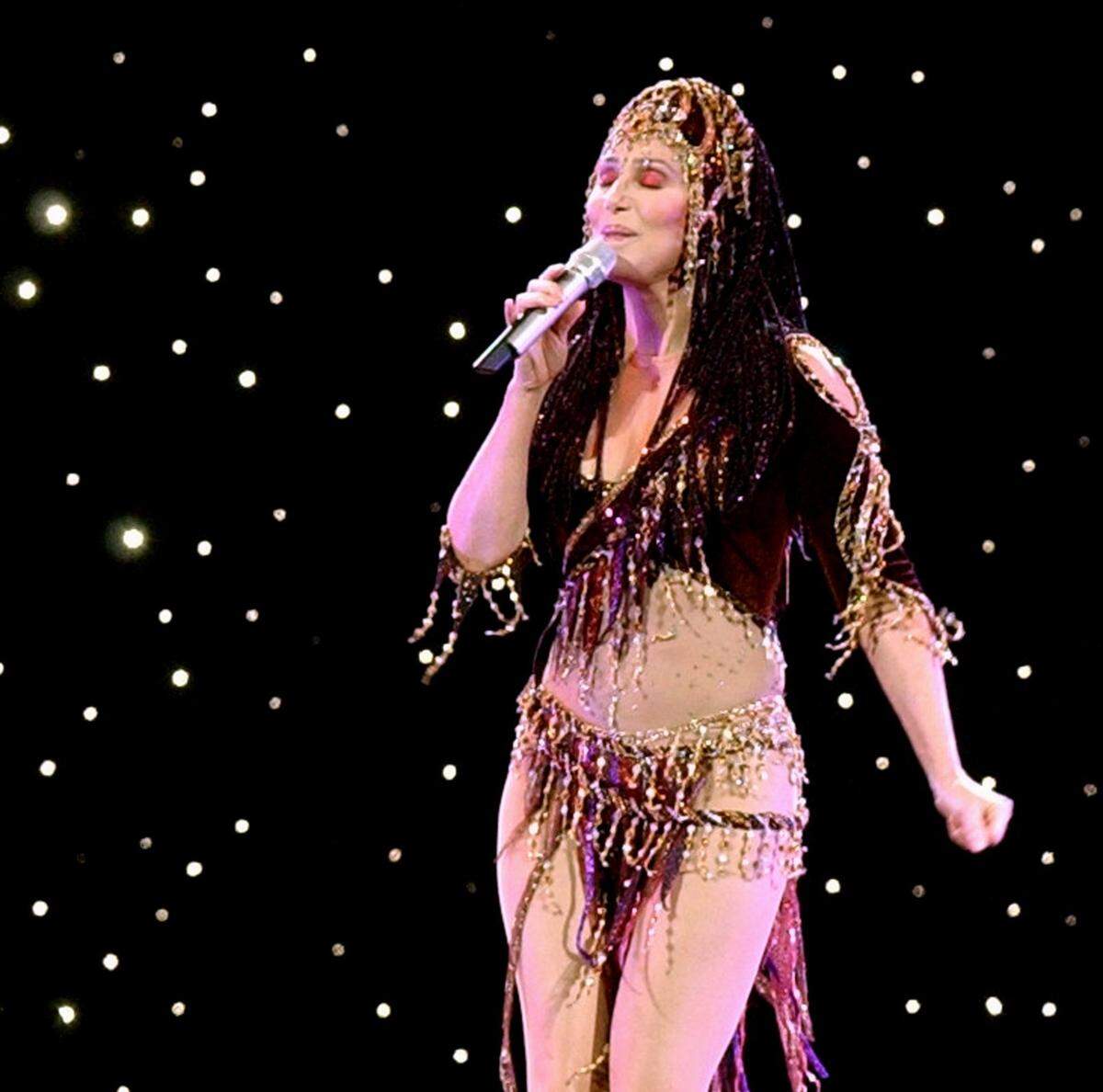 Cher wows the crowd at the Mississippi Coast Coliseum during her 2004 Farewell Tour. Cher was once married to the late Gregg Allman and spent tim in Macon, Georgia.
