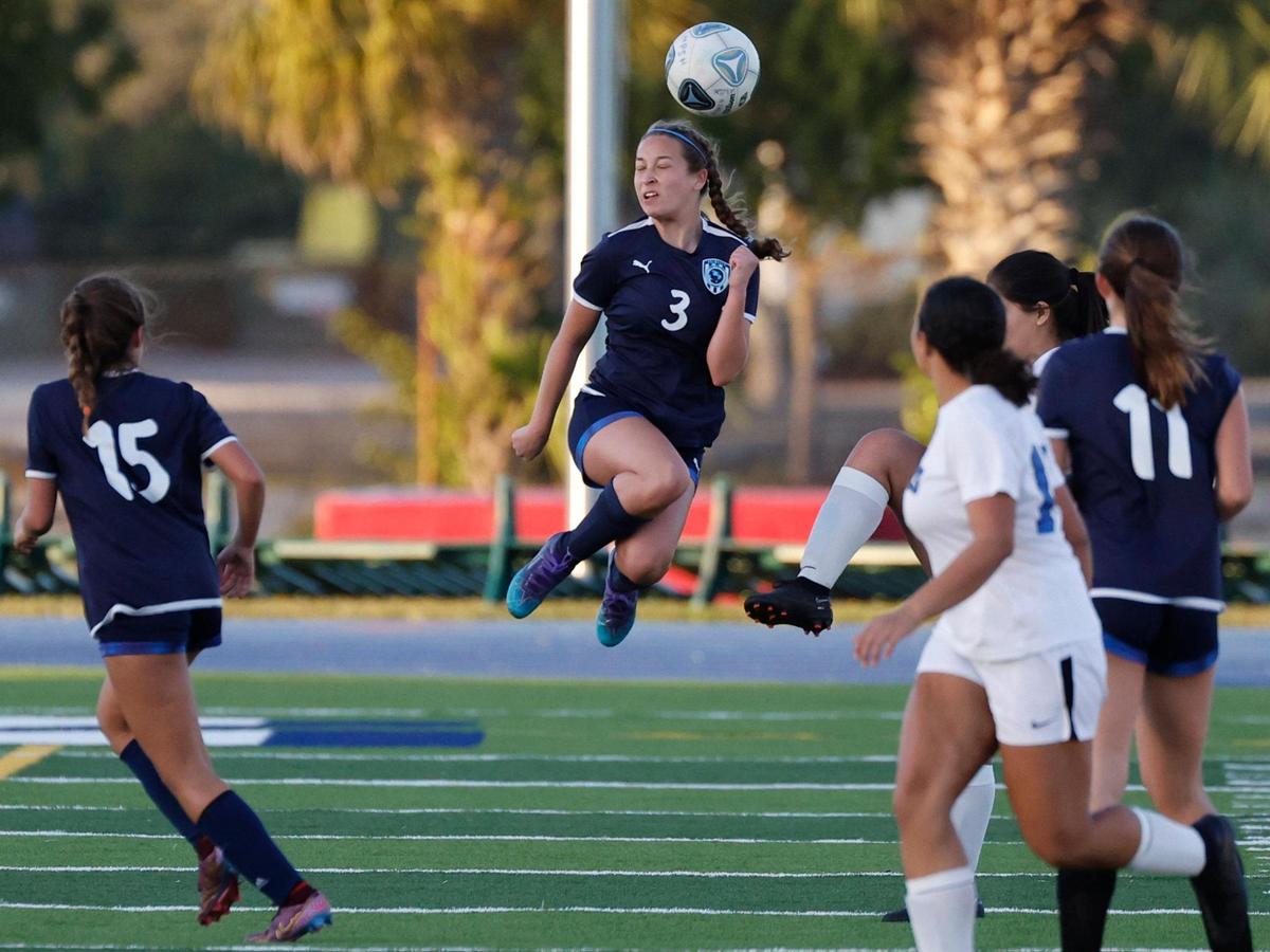 Palmetto High Schools Lexi Hershkowitz (3) goes for a header during the game against South Dade Senior High School during the GMAC soccer championship games at Traz Powell Stadium in Miami on Friday, January 13, 2023.