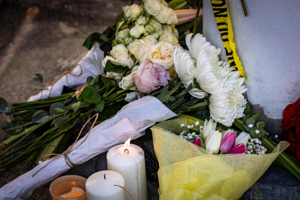 Flowers and candles on a makeshift memorial in the corner of Biscayne Boulevard and Northeast 22nd Street in Miami. A local mother group met at the makeshift memorial to pay respects to Jaklin Sabag, a 33-year-old mother who was killed in a crash while pushing her 8-month-old boy in a stroller across Biscayne Boulevard in Miami, Florida, on Wednesday, Feb. 14, 2024.