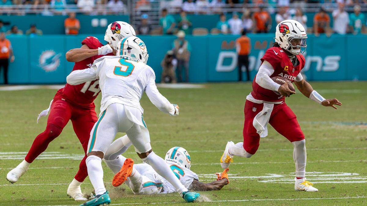 Arizona Cardinals quarterback Kyler Murray (1) runs as Miami Dolphins safety Marcus Maye (26) misses the tackle during the second half of an NFL game at Hard Rock Stadium on Sunday, Oct. 27, 2024, in Miami Gardens, Fla.