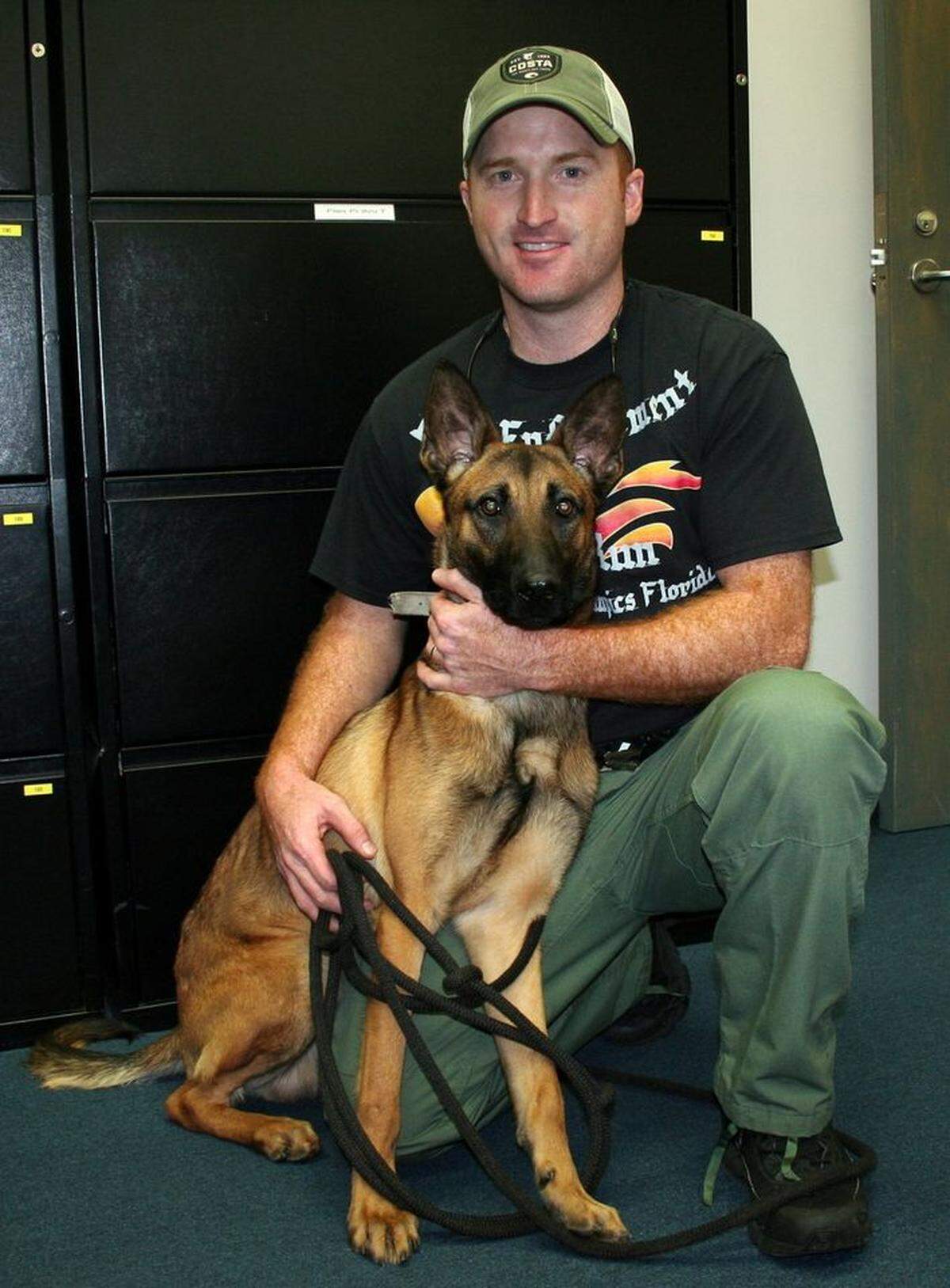 Lake Wales Police Officer Jared Joyner with his K-9 partner Max on their first day together, December 15, 2015.