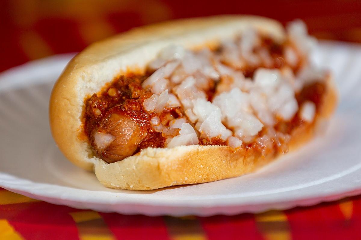 An original pork-and-beef hot dog with chili and onions