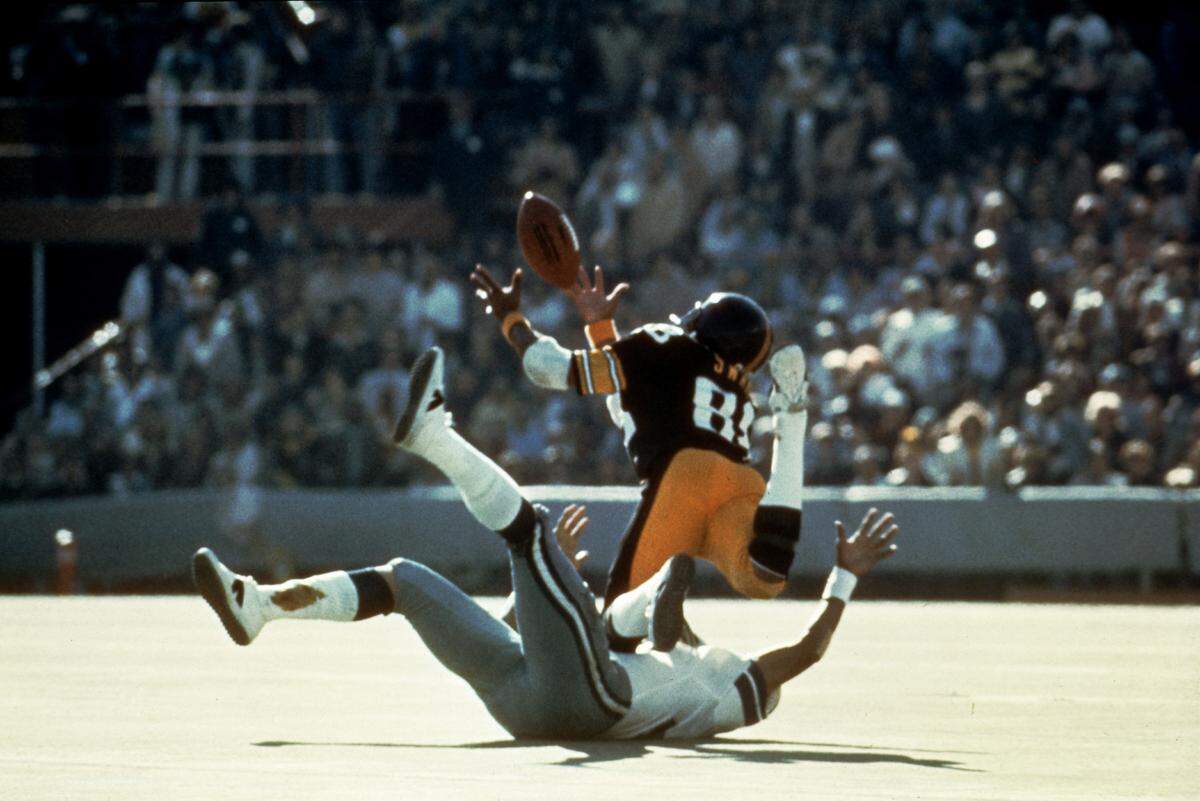 Pittsburgh Steelers’ Lynn Swann dives as he catches a pass from quarterback Terry Bradshaw during Super Bowl X at the Orange Bowl in Miami on Jan. 18, 1976 against the Dallas Cowboys.