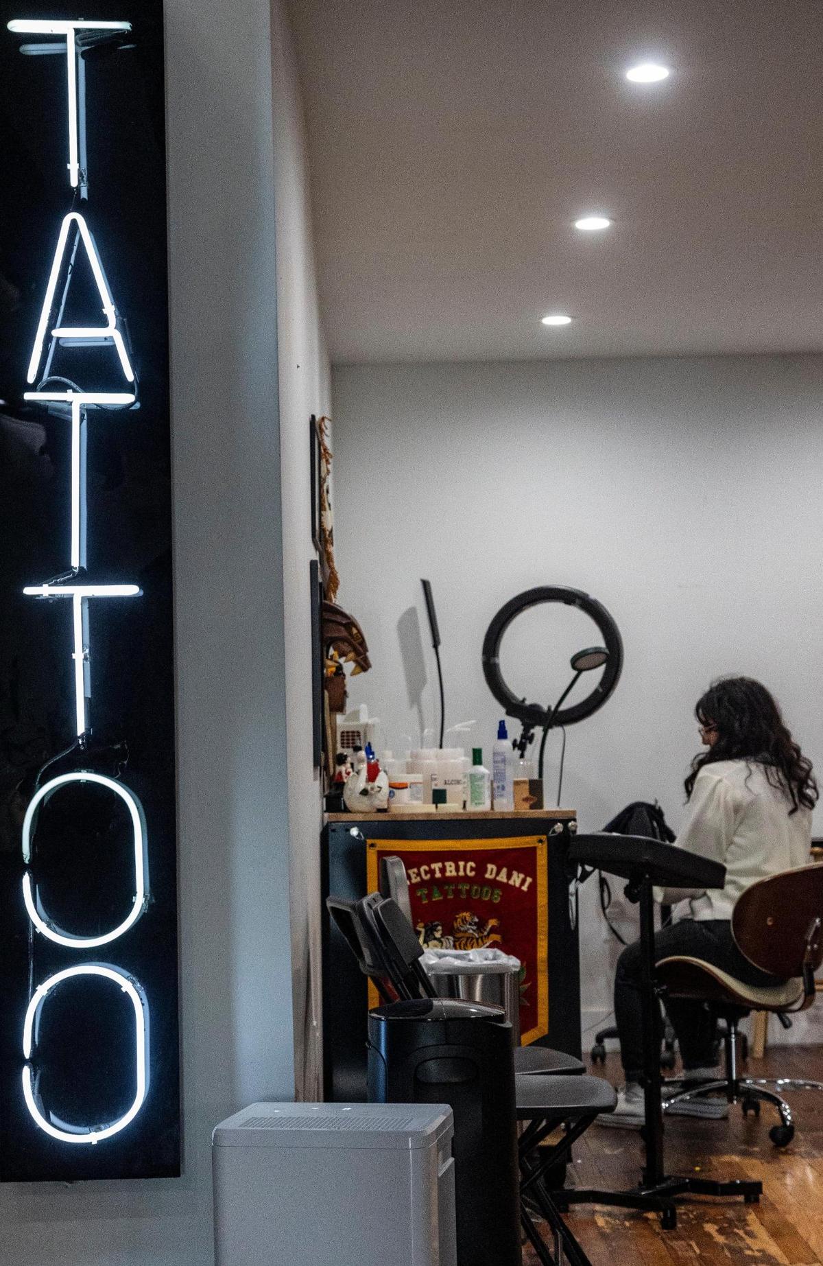 View inside the Ocho Placas tattoo shop inside White Rose Coffee.
