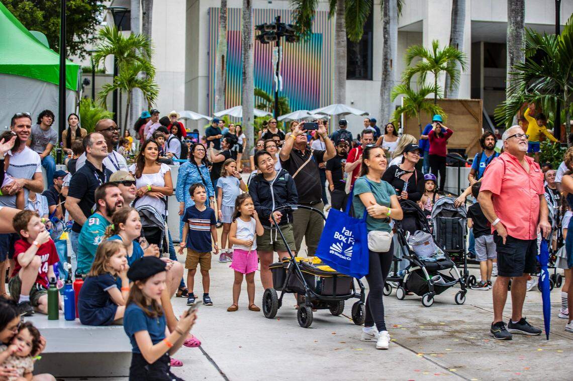 Families and kids enjoy the aerial performance Bloom! By Sway, at the Children’s Alley during the celebration of the Miami Book Fair’s 40th Edition, the most important literary event in South Florida, on Saturday November 18, 2023.