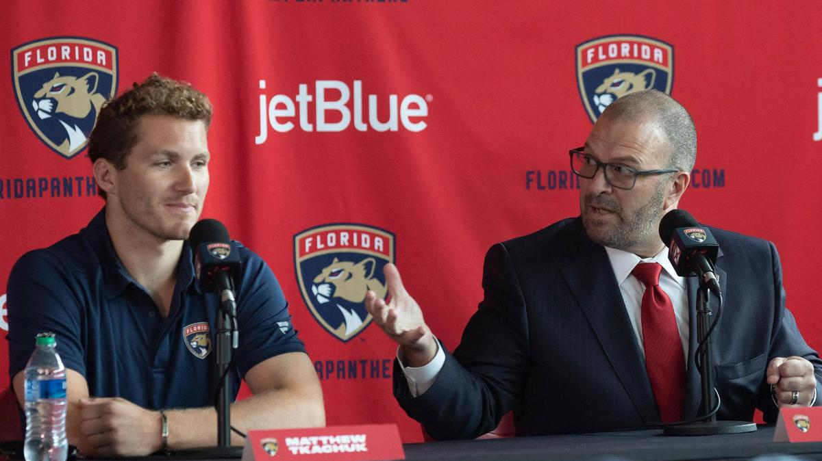 Forward Matthew Tkachuk (left) and Florida Panthers General Manager Bill Zito speak at a Florida Panthers introductory press conference at FLA Live Arena in Sunrise, Florida on Monday, July 25, 2022.
