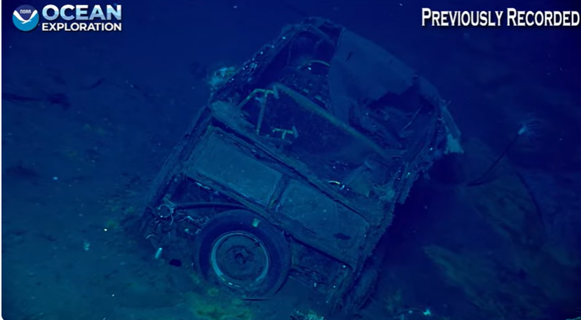 One possibility is the car came aboard when the Yorktown docked at Pearl Harbor to repair “damage sustained during the Battle of Coral Sea, historians say.