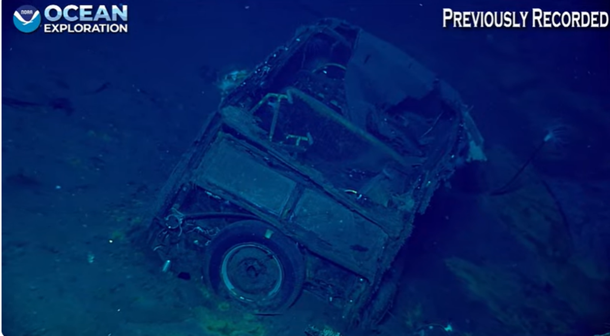One possibility is the car came aboard when the Yorktown docked at Pearl Harbor to repair “damage sustained during the Battle of Coral Sea, historians say.