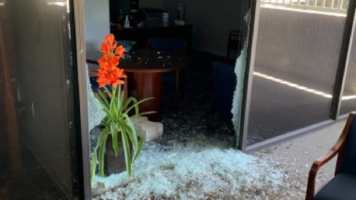 Damage at U.S. courthouse in Fort Lauderdale, which authorities say a man vandalized on Labor Day.