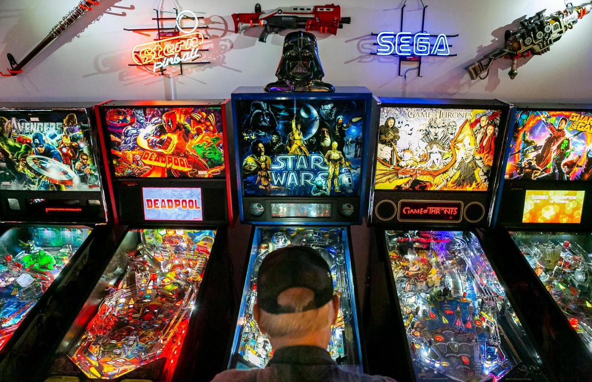 A man plays pinball at the Arcade Odyssey, 12045 SW 117th Ave., in Kendall on Saturday, May 8, 2021.