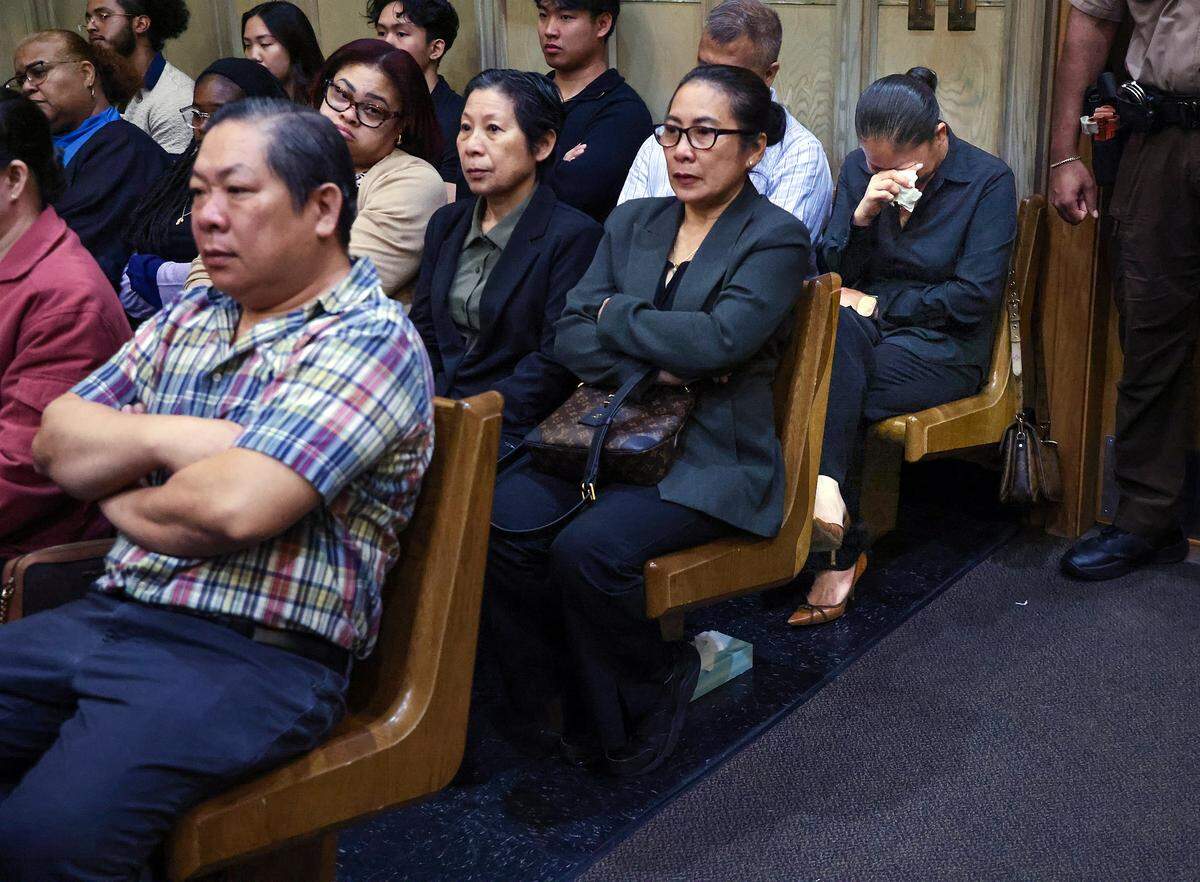 Lindsey Ma, right, the mother of Aaron Vu, weeps in court as the judge sentences Anthawn Ragan Jr. to life in prison for Aaron's murder during a 2013 robbery at the family's nail salon on Tuesday, March 10, 2026, at the Richard E. Gerstein Justice Building in Miami, Florida.
