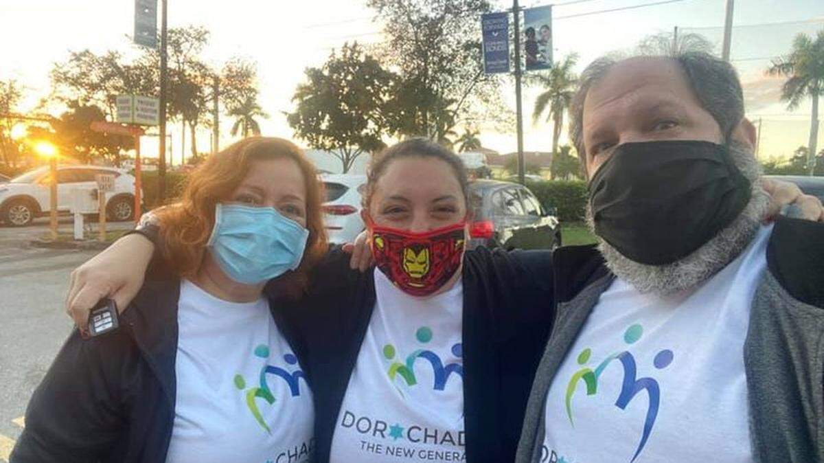 Lori Tabachnikoff, center, arranged for seniors from Congregation Dor Chadash to get the COVID-19 vaccine through Jackson Health System Jan. 22, 2021. She is pictured with volunteer Vanessa Jacobson and her husband Rabbi Jonathan Tabachnikoff.